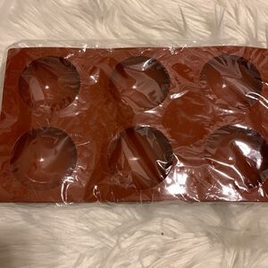 Set of three silicone six hole molds for baking.